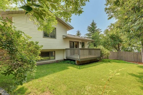 159 Woodbend Way, Okotoks, AB - Outdoor With Deck Patio Veranda