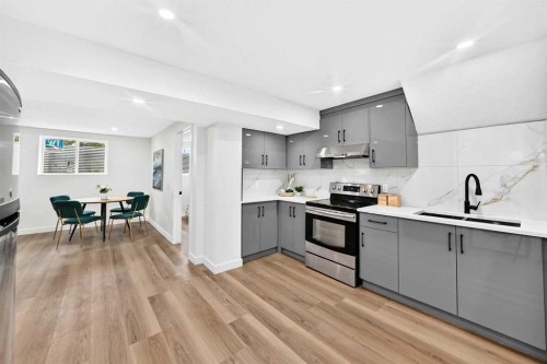 545 Madeira Drive Ne, Calgary, AB - Indoor Photo Showing Kitchen With Double Sink