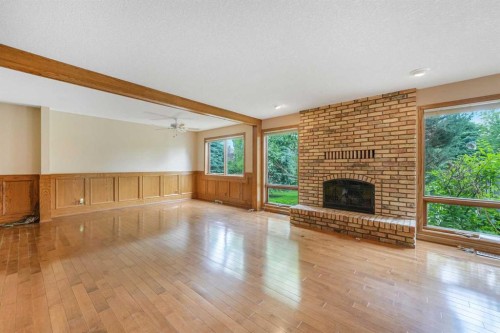 9144 Oakmount Drive Sw, Calgary, AB - Indoor With Fireplace