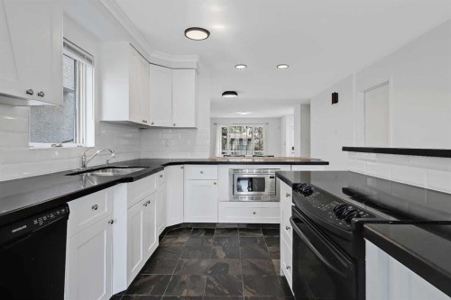 2622 24A Street Sw, Calgary, AB - Indoor Photo Showing Kitchen With Double Sink