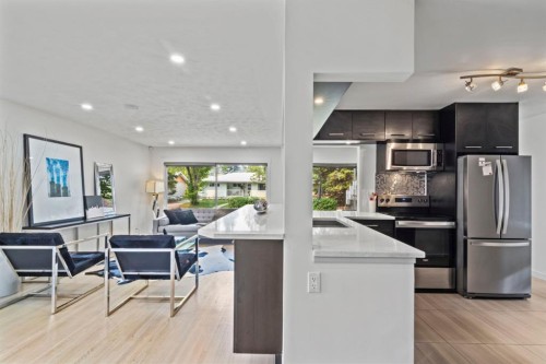 38 Westwood Drive Sw, Calgary, AB - Indoor Photo Showing Kitchen With Stainless Steel Kitchen With Upgraded Kitchen