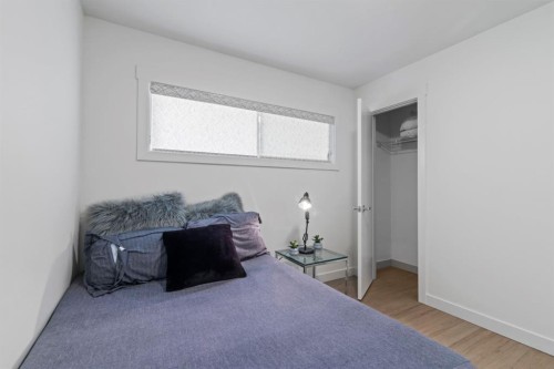 38 Westwood Drive Sw, Calgary, AB - Indoor Photo Showing Bedroom