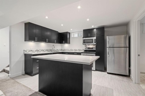 38 Westwood Drive Sw, Calgary, AB - Indoor Photo Showing Kitchen With Stainless Steel Kitchen With Upgraded Kitchen