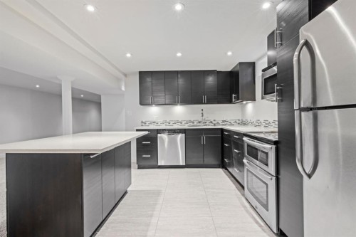 38 Westwood Drive Sw, Calgary, AB - Indoor Photo Showing Kitchen With Stainless Steel Kitchen With Upgraded Kitchen