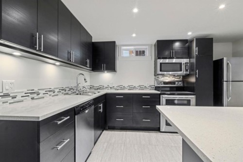 38 Westwood Drive Sw, Calgary, AB - Indoor Photo Showing Kitchen With Stainless Steel Kitchen With Upgraded Kitchen