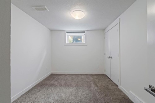 38 Westwood Drive Sw, Calgary, AB - Indoor Photo Showing Other Room