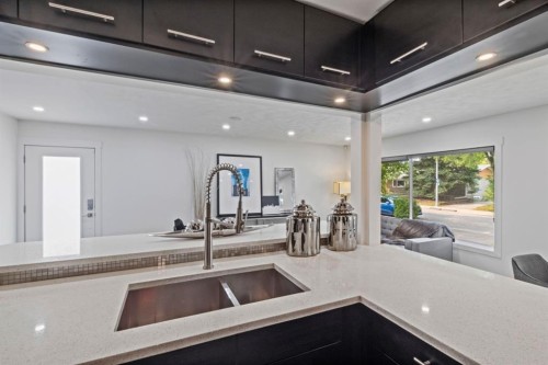 38 Westwood Drive Sw, Calgary, AB - Indoor Photo Showing Kitchen With Double Sink