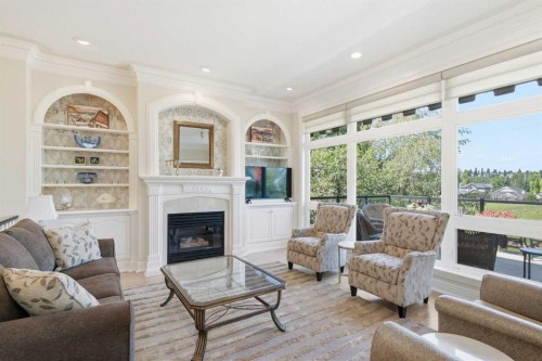 167 Valley Ridge Green Nw, Calgary, AB - Indoor Photo Showing Living Room With Fireplace