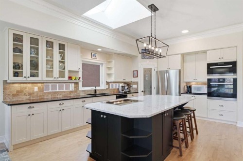 167 Valley Ridge Green Nw, Calgary, AB - Indoor Photo Showing Kitchen With Double Sink With Upgraded Kitchen