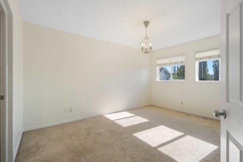 78 Cougar Plateau Way Sw, Calgary, AB - Indoor Photo Showing Other Room