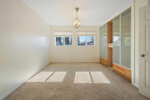 78 Cougar Plateau Way Sw, Calgary, AB - Indoor Photo Showing Other Room