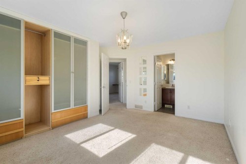 78 Cougar Plateau Way Sw, Calgary, AB - Indoor Photo Showing Other Room