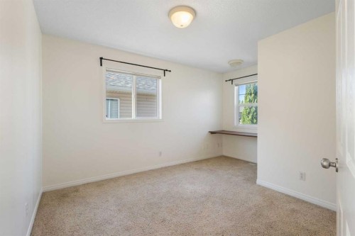 78 Cougar Plateau Way Sw, Calgary, AB - Indoor Photo Showing Other Room