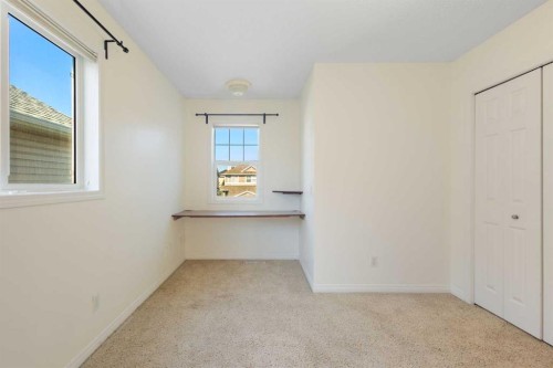 78 Cougar Plateau Way Sw, Calgary, AB - Indoor Photo Showing Other Room