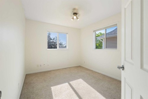 78 Cougar Plateau Way Sw, Calgary, AB - Indoor Photo Showing Other Room
