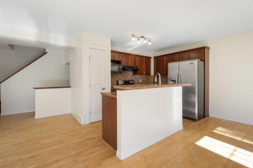 78 Cougar Plateau Way Sw, Calgary, AB - Indoor Photo Showing Kitchen