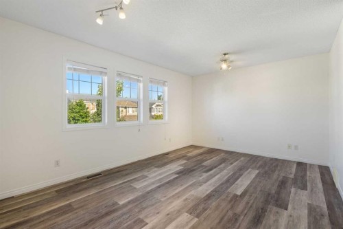 78 Cougar Plateau Way Sw, Calgary, AB - Indoor Photo Showing Other Room