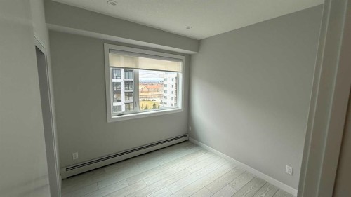 609-8370 Broadcast Avenue Sw, Calgary, AB - Indoor Photo Showing Other Room