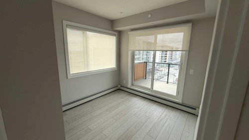 609-8370 Broadcast Avenue Sw, Calgary, AB - Indoor Photo Showing Other Room