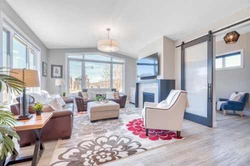 6 Legacy Woods Crescent Se, Calgary, AB - Indoor Photo Showing Living Room With Fireplace