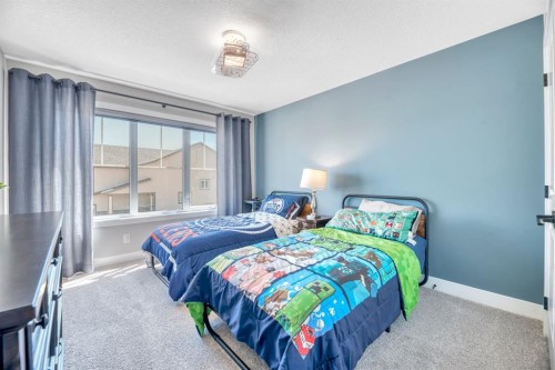 6 Legacy Woods Crescent Se, Calgary, AB - Indoor Photo Showing Bedroom