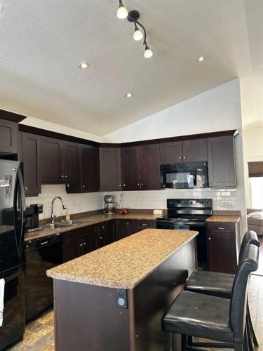 1319 54 Avenue Close, Lloydminster, AB - Indoor Photo Showing Kitchen With Double Sink