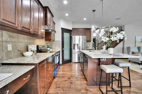 212 Everbrook Way Sw, Calgary, AB - Indoor Photo Showing Kitchen With Stainless Steel Kitchen With Upgraded Kitchen