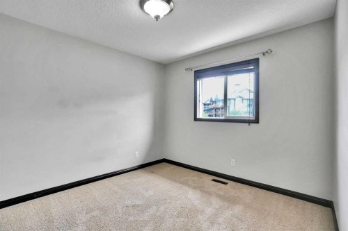212 Everbrook Way Sw, Calgary, AB - Indoor Photo Showing Other Room
