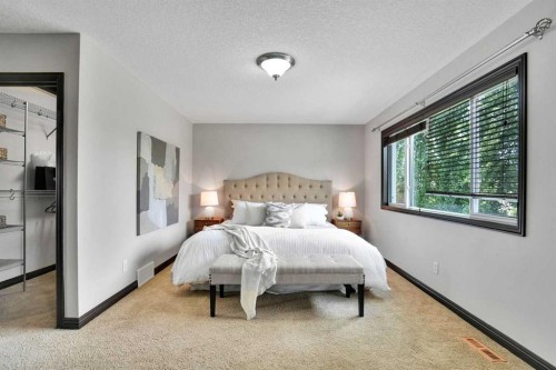 212 Everbrook Way Sw, Calgary, AB - Indoor Photo Showing Bedroom