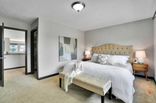 212 Everbrook Way Sw, Calgary, AB - Indoor Photo Showing Bedroom