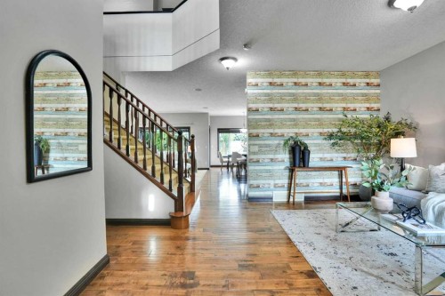 212 Everbrook Way Sw, Calgary, AB - Indoor With Fireplace