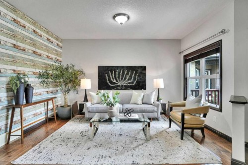 212 Everbrook Way Sw, Calgary, AB - Indoor Photo Showing Living Room