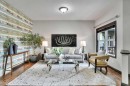 212 Everbrook Way Sw, Calgary, AB  - Indoor Photo Showing Living Room 