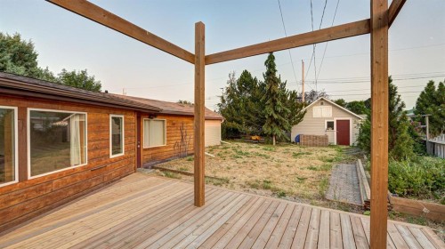 335 50 Avenue West, Claresholm, AB - Outdoor With Deck Patio Veranda With Exterior