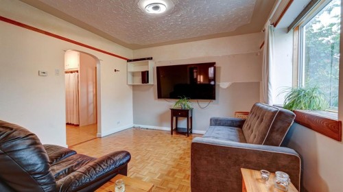 335 50 Avenue West, Claresholm, AB - Indoor Photo Showing Living Room