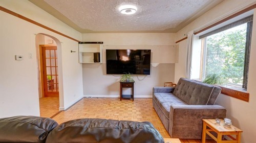 335 50 Avenue West, Claresholm, AB - Indoor Photo Showing Living Room