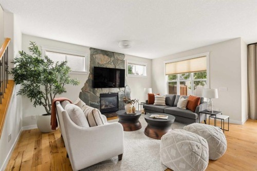 4649 20 Street Sw, Calgary, AB - Indoor Photo Showing Living Room With Fireplace