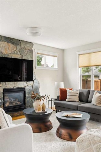 4649 20 Street Sw, Calgary, AB - Indoor Photo Showing Living Room With Fireplace