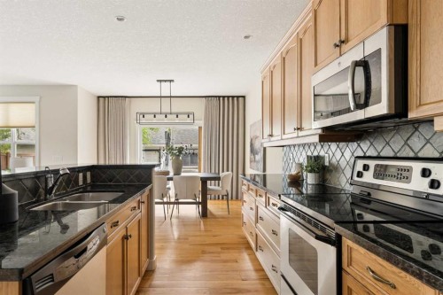 4649 20 Street Sw, Calgary, AB - Indoor Photo Showing Kitchen With Stainless Steel Kitchen With Double Sink With Upgraded Kitchen