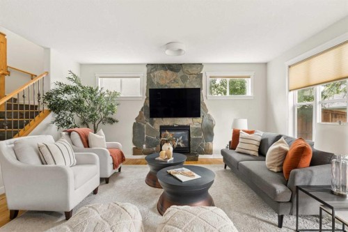 4649 20 Street Sw, Calgary, AB - Indoor Photo Showing Living Room With Fireplace