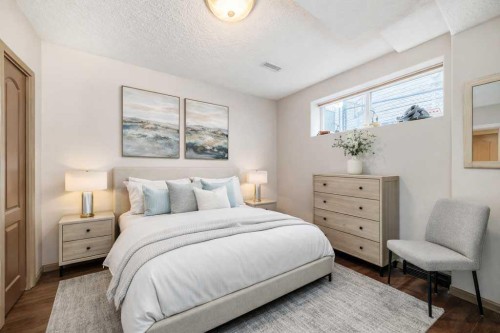 40 Cougar Ridge Heights Sw, Calgary, AB - Indoor Photo Showing Bedroom