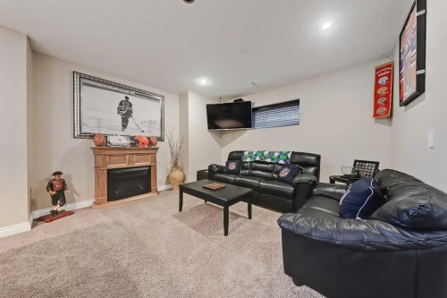 46 Spring View Sw, Calgary, AB - Indoor With Fireplace