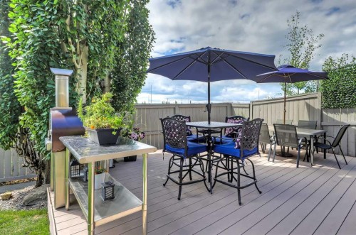 46 Spring View Sw, Calgary, AB - Outdoor With Deck Patio Veranda