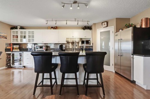 46 Spring View Sw, Calgary, AB - Indoor Photo Showing Other Room