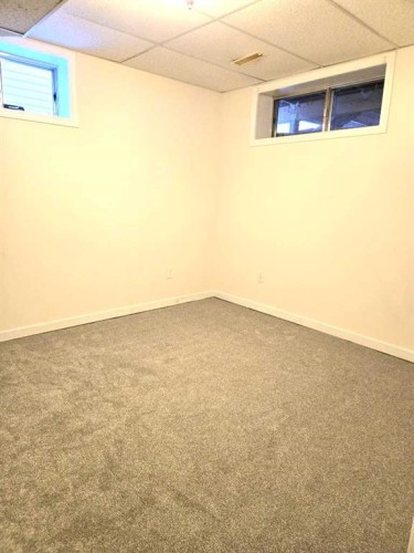 182 Coventry Close Ne, Calgary, AB - Indoor Photo Showing Other Room