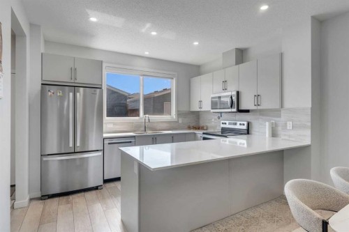 97 Corner Glen Way Ne, Calgary, AB - Indoor Photo Showing Kitchen With Stainless Steel Kitchen With Upgraded Kitchen