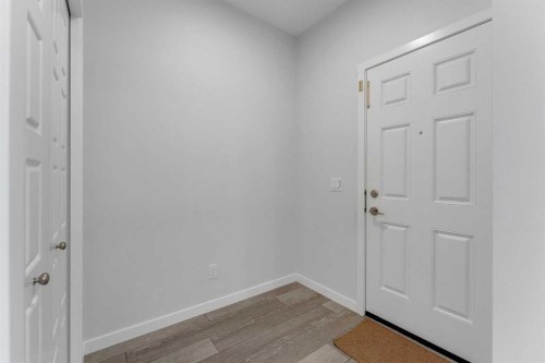 97 Corner Glen Way Ne, Calgary, AB - Indoor Photo Showing Other Room