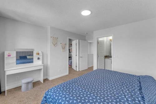 97 Corner Glen Way Ne, Calgary, AB - Indoor Photo Showing Bedroom