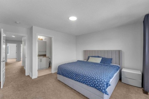 97 Corner Glen Way Ne, Calgary, AB - Indoor Photo Showing Bedroom
