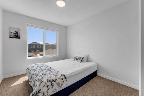 97 Corner Glen Way Ne, Calgary, AB - Indoor Photo Showing Bedroom